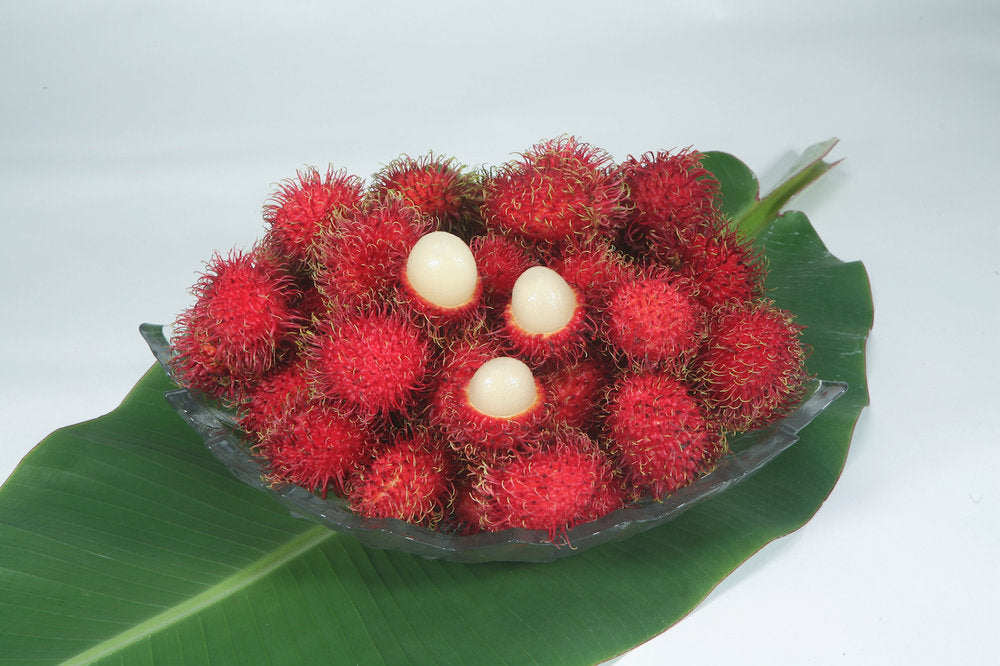 Platter of fresh rambutan fruit from Hawaii.